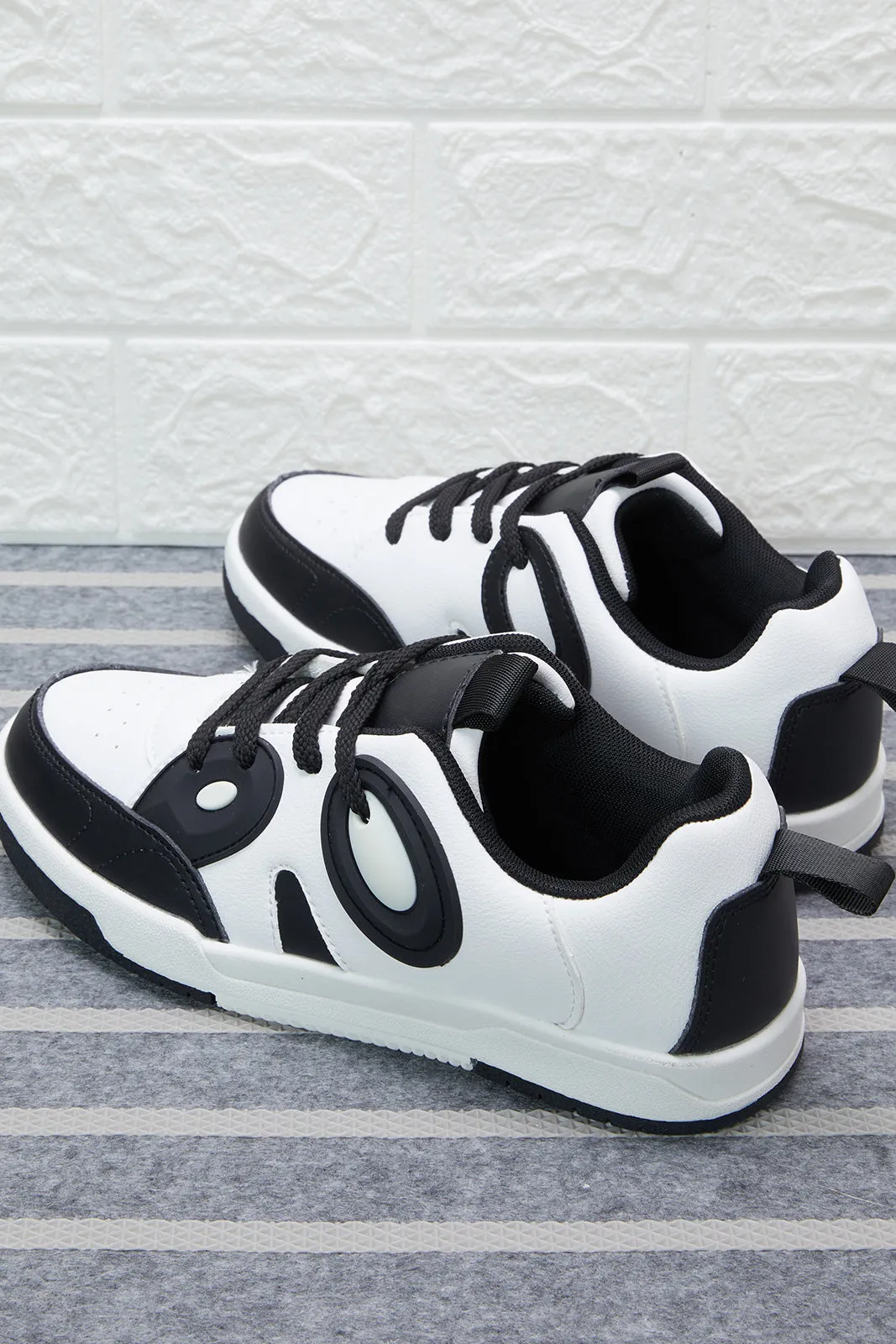 Senior Boys White And Black Sneakers