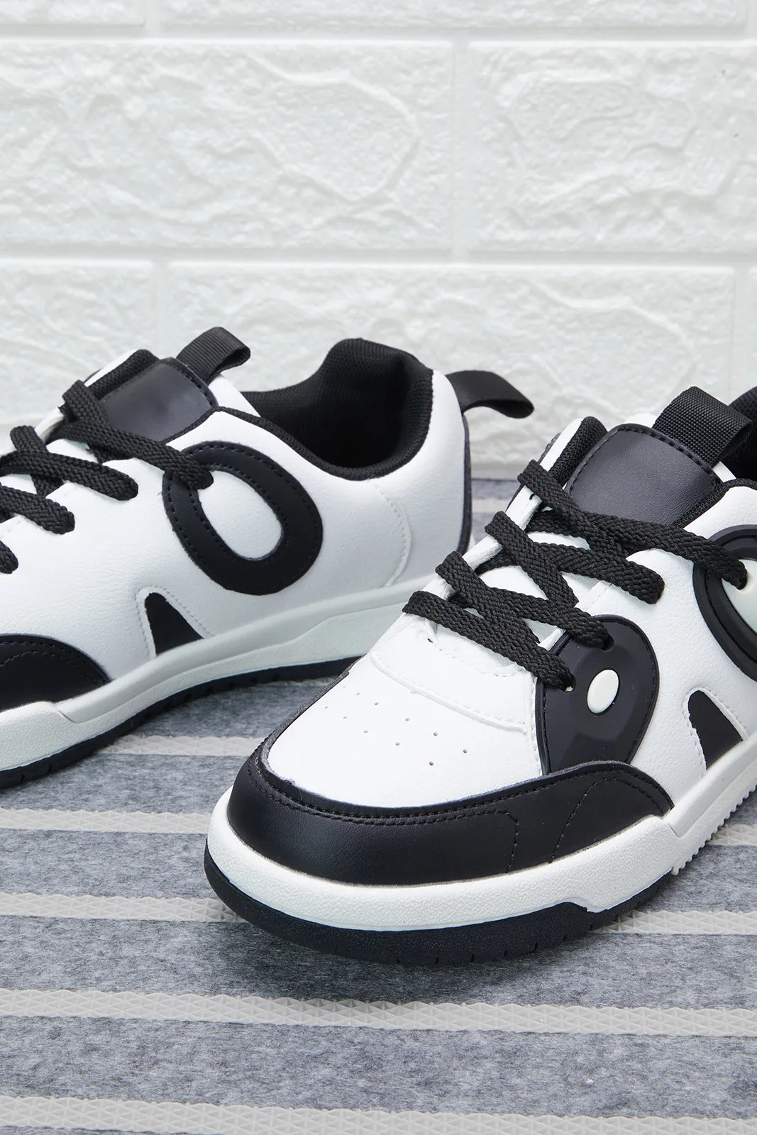 Senior Boys White And Black Sneakers